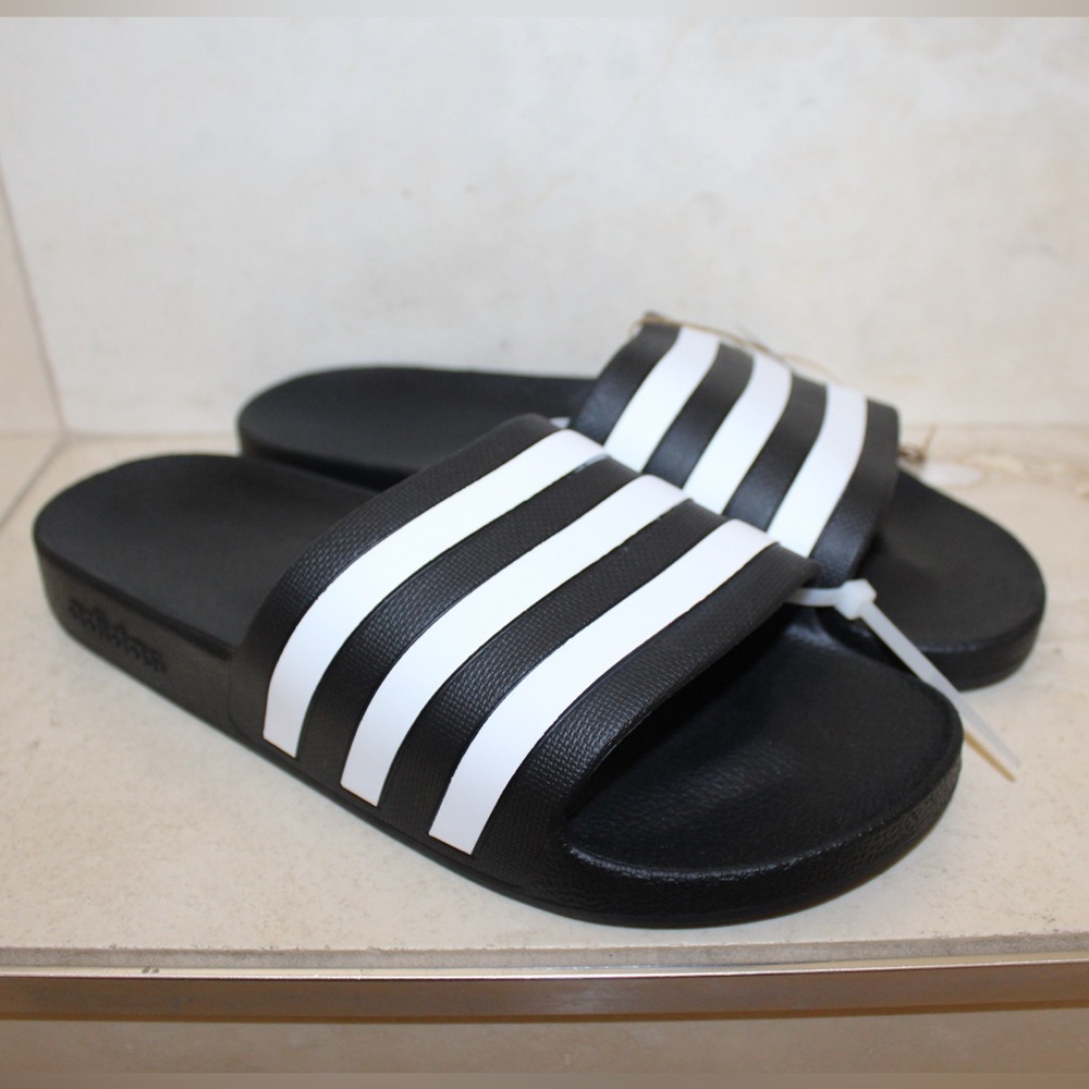 Adidas Adilette slides (women’s 9) (NWT)
